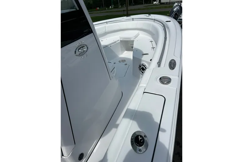 Slide: The Image of 2026 Sportsman Open 232 Center Console boat, featuring sleek white design and spacious deck. - 3