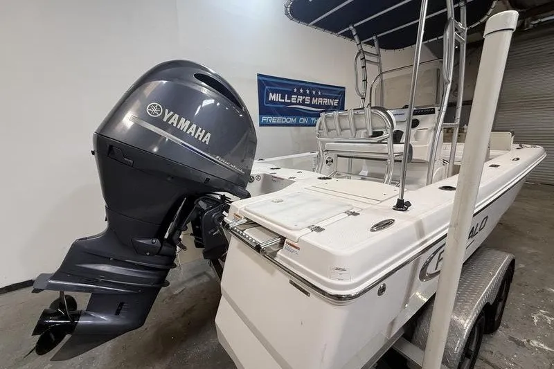 Slide: The Image of 2020 Robalo 206 Cayman boat with Yamaha outboard motor in showroom. - 4