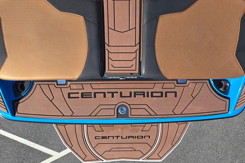 Slide: The Image of 2021 Centurion Ri257 boat deck with custom brown and black design. - 19
