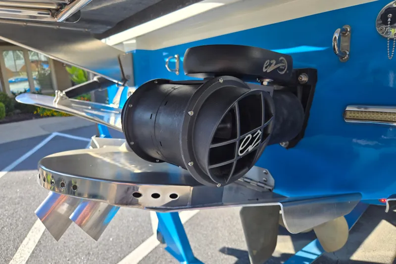 Slide: The Image of Rear view of a 2021 Centurion Ri257 boat's propulsion system and exhaust. - 28