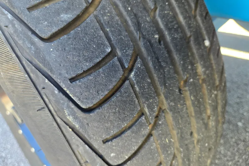 Slide: The Image of Close-up of a 2021 Centurion Ri257 tire tread pattern. - 31