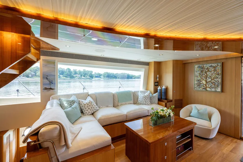 Slide: The Image of Luxurious 2019 Horizon PC65 yacht interior with elegant seating and scenic window view. - 31