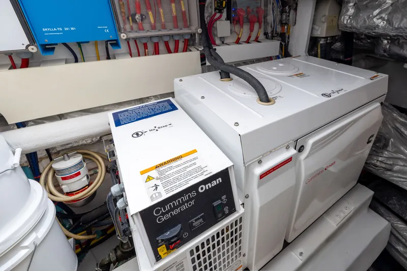 Slide: The Image of Cummins Onan generator in Horizon PC65 yacht engine room, 2019 model. - 50