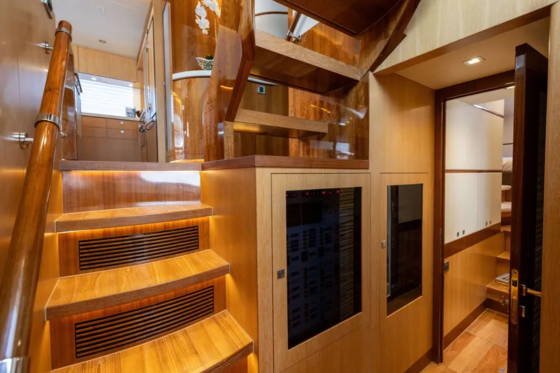 Slide: The Image of Luxurious wooden interior of 2019 Horizon PC65 yacht with elegant staircase and modern design. - 33