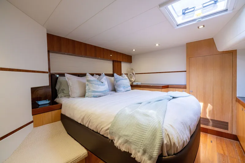 Slide: The Image of Luxurious cabin interior of 2019 Horizon PC65 yacht with cozy bedding and modern design. - 42
