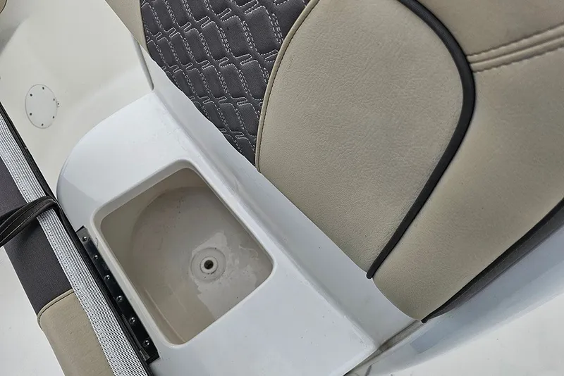 Slide: The Image of Close-up of 2021 Tidewater 232 CC Adventure boat seat and storage compartment. - 24