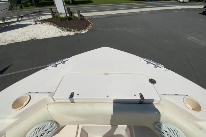Slide: The Image of Bow view of 2011 Grady-White Freedom 255 boat, showcasing seating and storage area. - 19