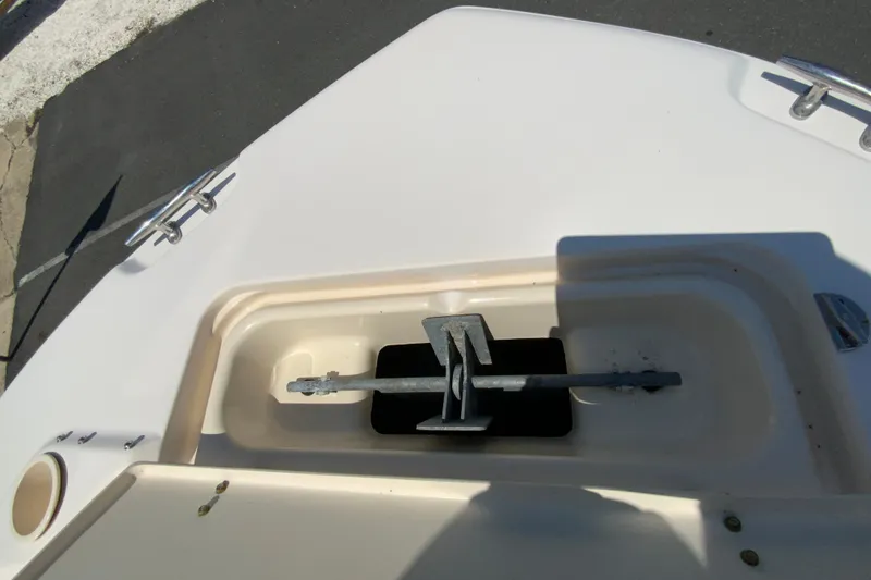 Slide: The Image of Bow anchor compartment of 2011 Grady-White Freedom 255 boat, showing anchor storage. - 20