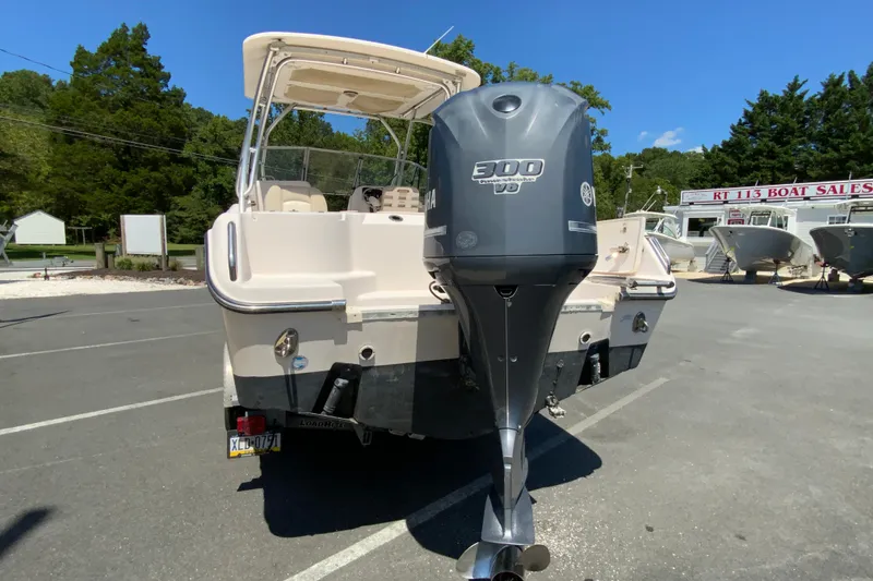 Slide: The Image of 2011 Grady-White Freedom 255 boat with Yamaha 300 outboard motor at dealership. - 8