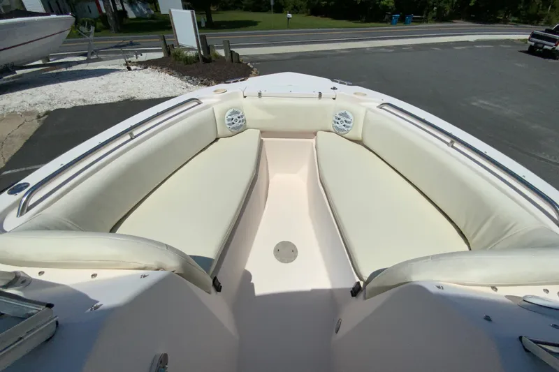 Slide: The Image of 2011 Grady-White Freedom 255 boat with spacious bow seating and white upholstery. - 21