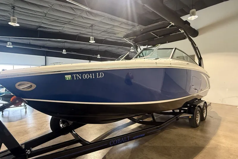 Slide: The Image of 2014 Cobalt R5 WSS boat on trailer in indoor showroom. - 14