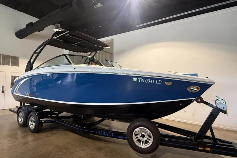 The Image of 2014 Cobalt R5 WSS boat on trailer in indoor showroom. - 1
