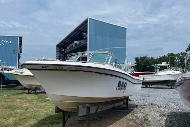 The Image of 1990 Grady-White Tournament 192 boat named "Bad Company" in marina storage. - 1