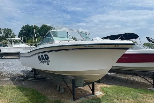 Slide: The Image of 1990 Grady-White Tournament 192 boat on display, labeled "Bad Company." - 3