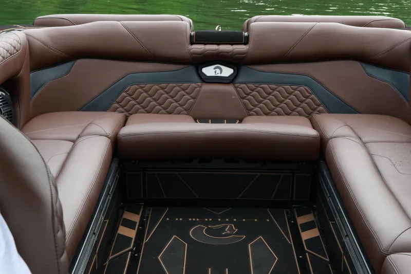 Slide: The Image of Luxurious brown leather seating in 2026 Centurion Ri265 boat interior. - 15
