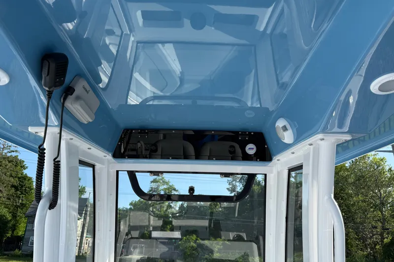 Slide: The Image of Interior view of 2026 Sportsman Heritage 231 Center Console boat's helm area. - 10