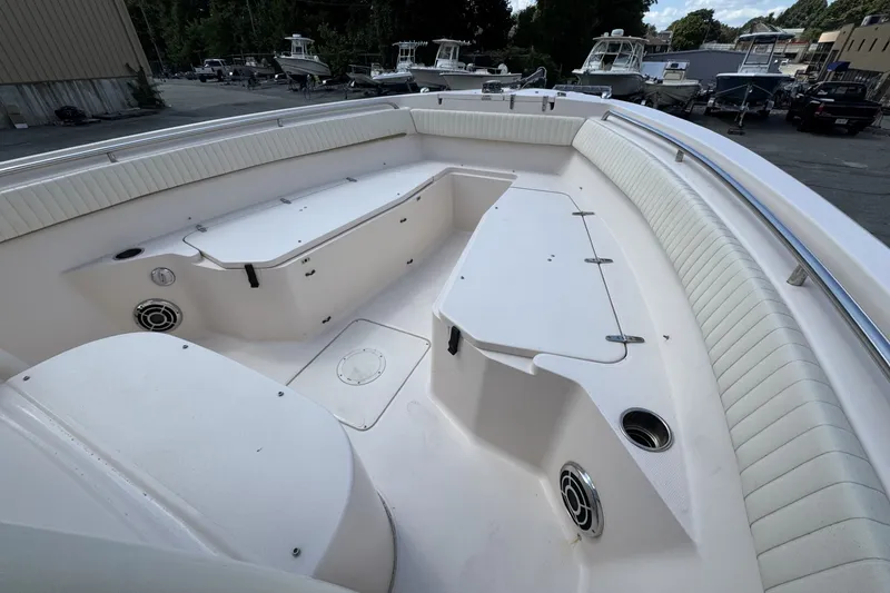 Slide: The Image of 2014 Grady-White Canyon 283 boat interior with spacious seating and storage compartments. - 20
