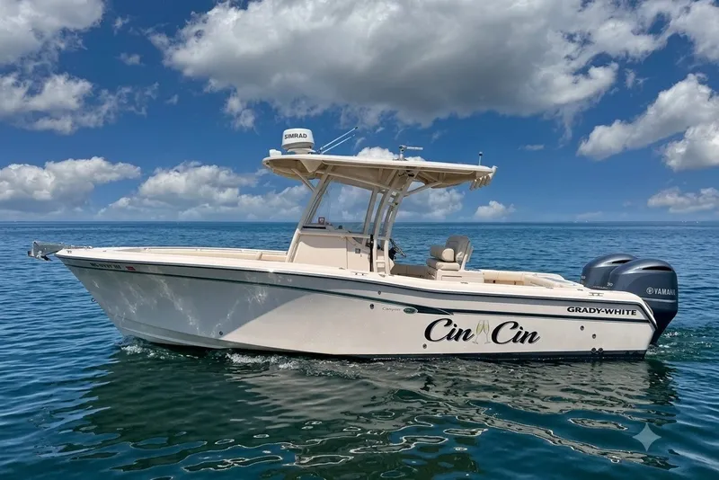 Slide: The Image of 2014 Grady-White Canyon 283 boat on calm ocean under blue sky. - 36