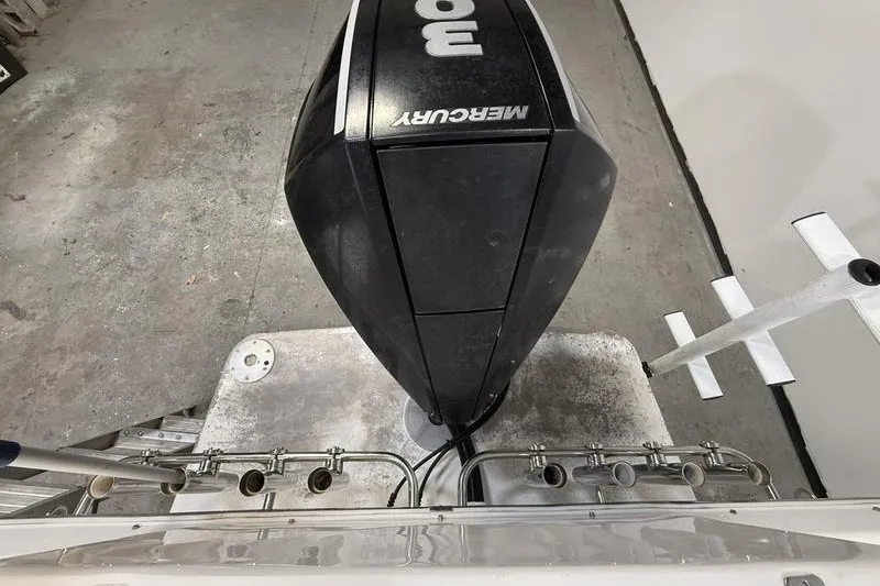 Slide: The Image of Mercury outboard motor on 2002 Sea Pro 235 Walk Around boat, viewed from above. - 5