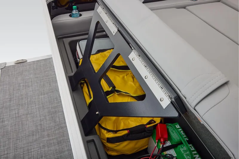 Slide: The Image of Manufacturer Provided Image: Storage compartment in 2026 Sun Tracker Party Barge 22 RF DLX with yellow bag and battery. - 51