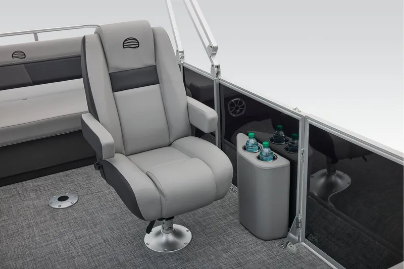 Slide: The Image of Manufacturer Provided Image: 2026 Sun Tracker Party Barge 22 RF DLX interior with plush seating and cup holders. - 41