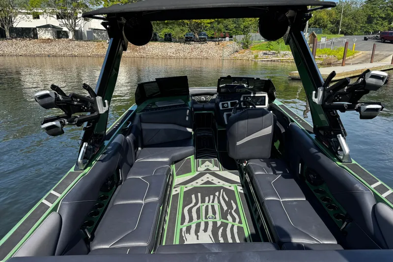 Slide: The Image of Luxurious 2026 Centurion Nv243 boat interior with sleek seating and advanced controls. - 17