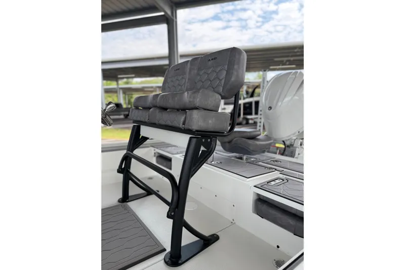 Slide: The Image of Avid 21 Mag 2027 boat seat with quilted design and sturdy frame. - 21