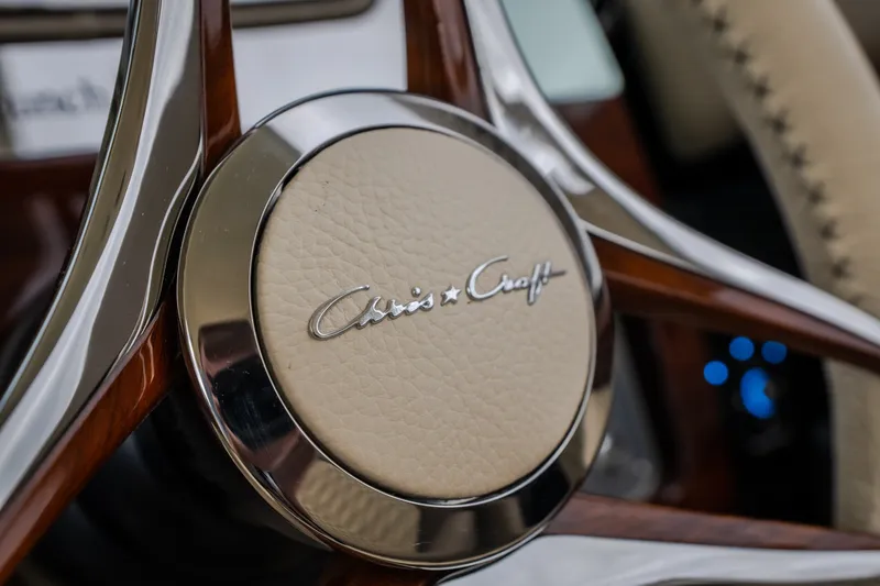 Slide: The Image of Close-up of 2027 Chris-Craft Launch 35 GT steering wheel emblem. - 55