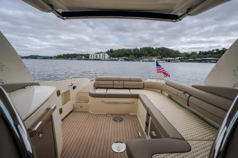 Slide: The Image of Luxurious 2027 Chris-Craft Launch 35 GT boat interior with elegant seating and scenic water view. - 44