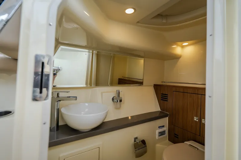 Slide: The Image of Luxurious bathroom interior of 2027 Chris-Craft Launch 35 GT boat, featuring modern fixtures. - 65