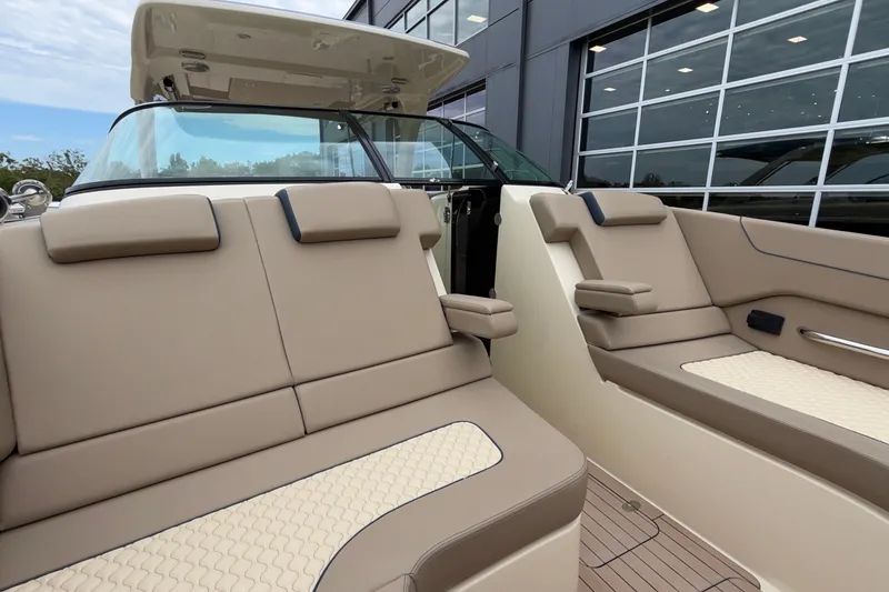 Slide: The Image of 2027 Chris-Craft Launch 35 GT luxury boat interior with beige seating and modern design. - 56