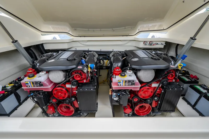 Slide: The Image of Engine compartment of 2027 Chris-Craft Launch 35 GT, showcasing dual powerful engines. - 32