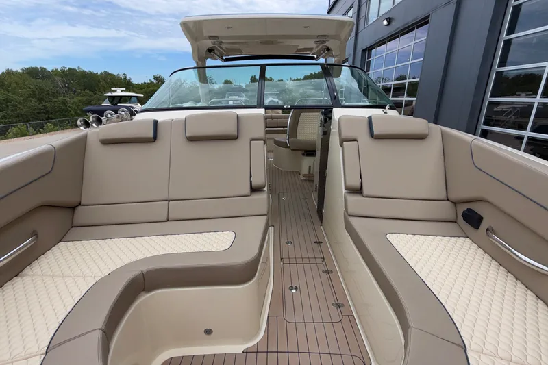 Slide: The Image of Luxurious interior of 2027 Chris-Craft Launch 35 GT boat with beige seating and sleek design. - 55