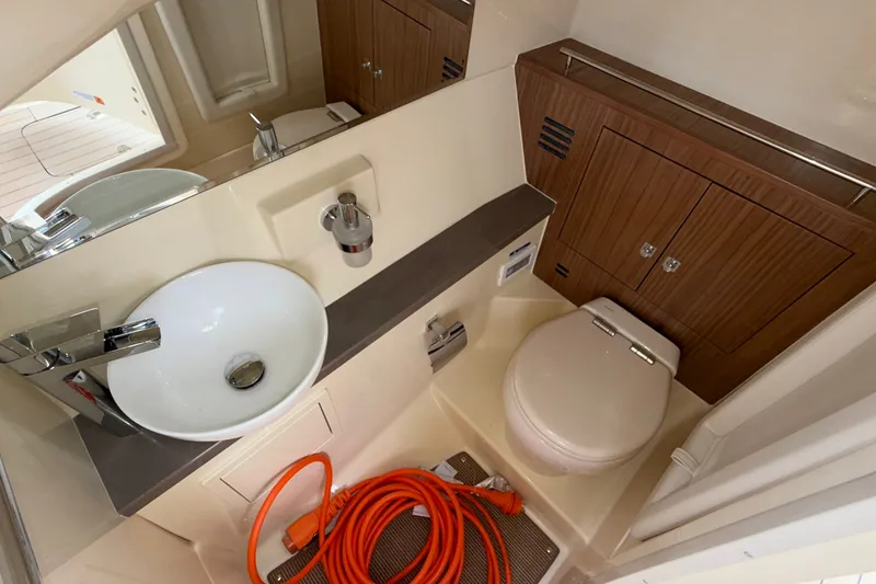 Slide: The Image of Luxurious bathroom interior of 2027 Chris-Craft Launch 35 GT boat, featuring modern fixtures. - 45