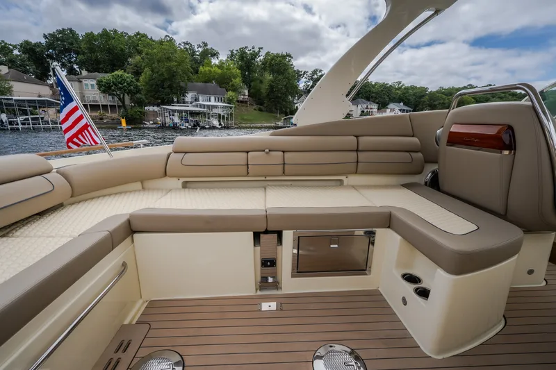 Slide: The Image of Luxurious 2027 Chris-Craft Launch 35 GT boat interior with elegant seating and scenic lake view. - 25