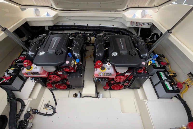 Slide: The Image of Engine compartment of 2027 Chris-Craft Launch 35 GT, featuring dual Volvo Penta engines. - 66