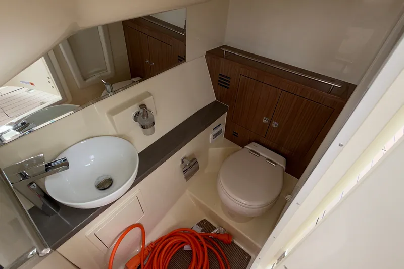 Slide: The Image of Luxurious bathroom interior of 2027 Chris-Craft Launch 35 GT boat, featuring modern fixtures. - 44