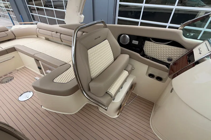 Slide: The Image of Luxurious interior of 2027 Chris-Craft Launch 35 GT boat with elegant seating and wood flooring. - 38