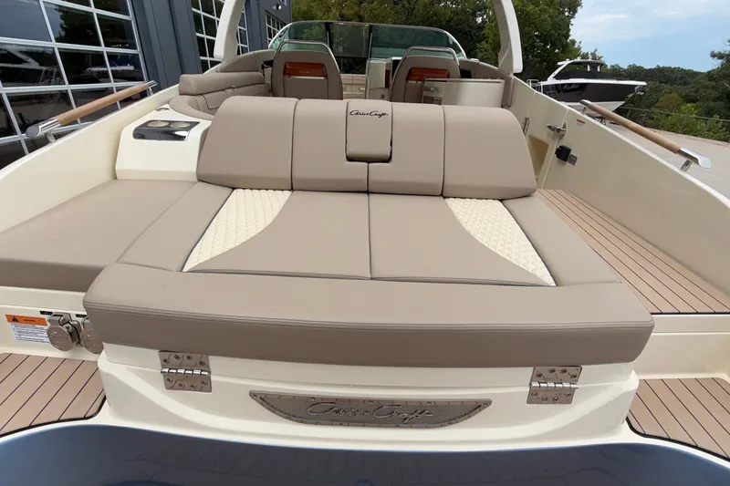 Slide: The Image of 2027 Chris-Craft Launch 35 GT boat with luxurious beige seating and sleek design. - 13