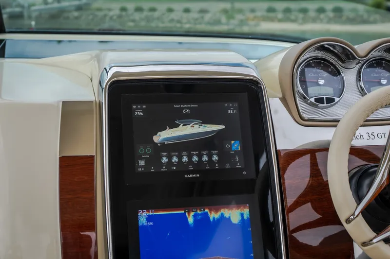 Slide: The Image of Dashboard of 2027 Chris-Craft Launch 35 GT with Garmin display and gauges. - 51