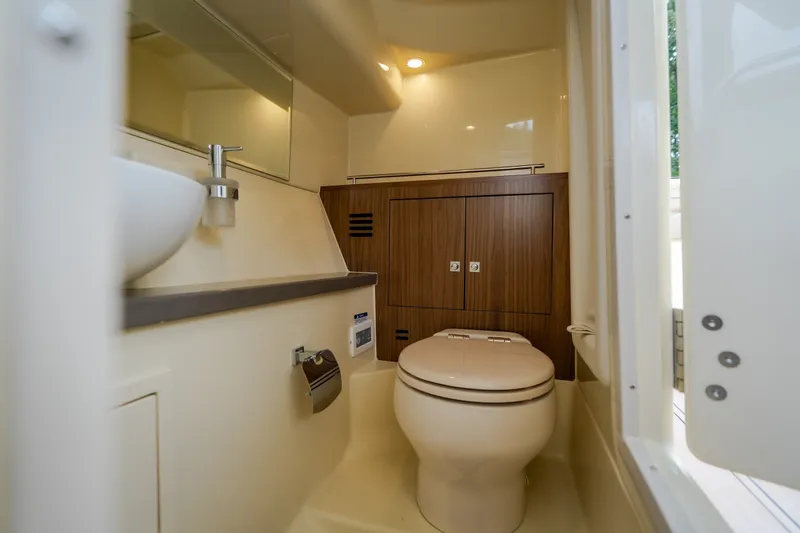 Slide: The Image of Luxurious bathroom interior of 2027 Chris-Craft Launch 35 GT boat, featuring modern fixtures. - 66