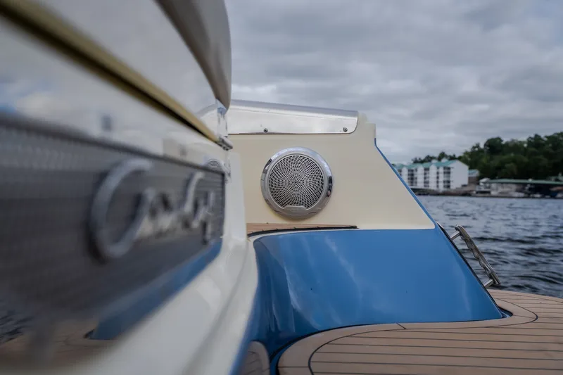 Slide: The Image of 2027 Chris-Craft Launch 35 GT boat detail with speaker, dockside view. - 18