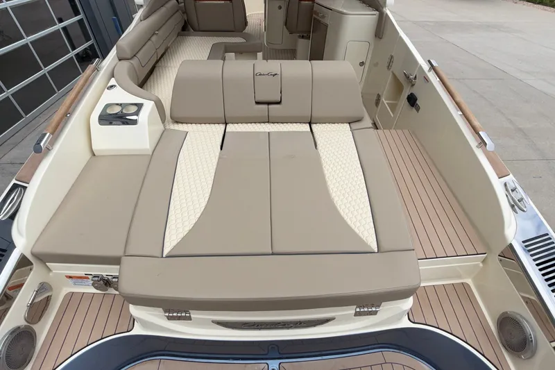 Slide: The Image of Luxurious interior of 2027 Chris-Craft Launch 35 GT boat with beige seating and wood accents. - 21
