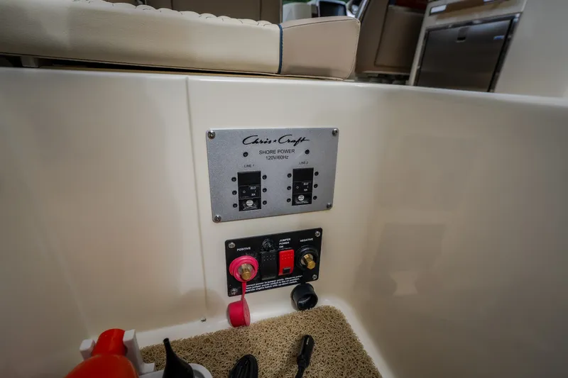 Slide: The Image of Control panel of 2027 Chris-Craft Launch 35 GT boat, featuring shore power connections. - 37