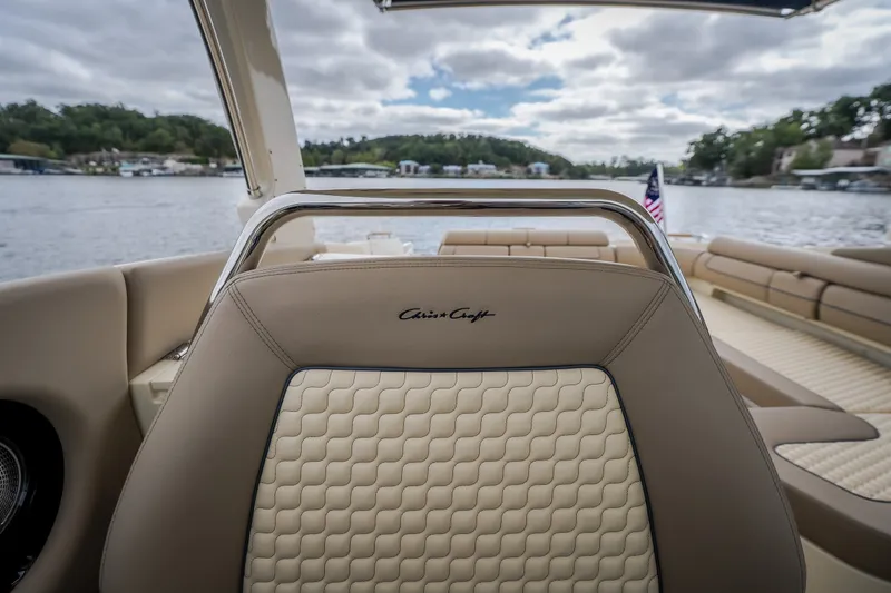 Slide: The Image of 2027 Chris-Craft Launch 35 GT boat interior with luxurious seating and lake view. - 59