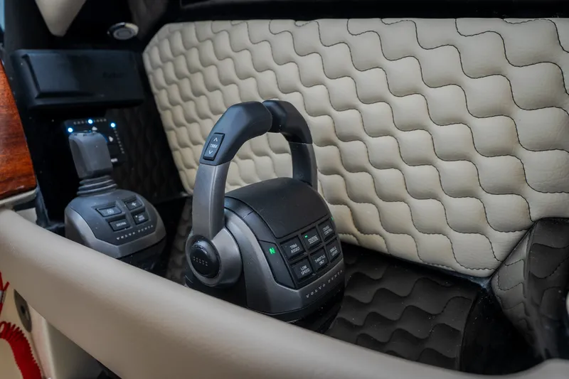 Slide: The Image of 2027 Chris-Craft Launch 35 GT interior controls with quilted leather detailing. - 56
