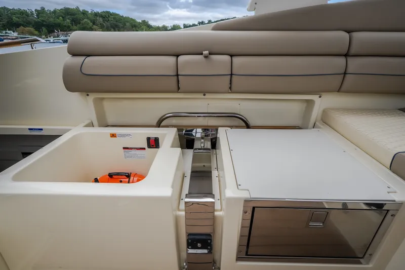 Slide: The Image of 2027 Chris-Craft Launch 35 GT boat interior with storage compartments and seating. - 40