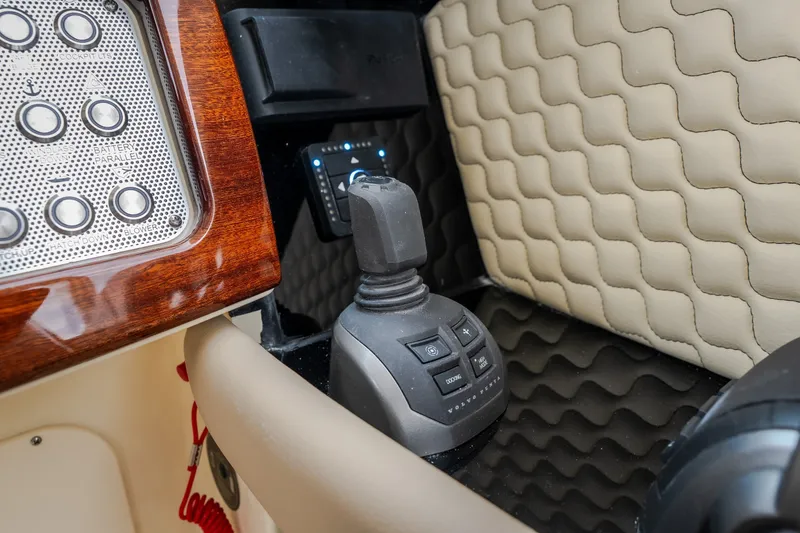 Slide: The Image of Control panel and joystick of 2027 Chris-Craft Launch 35 GT boat interior. - 57