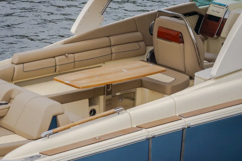 Slide: The Image of Luxurious interior of 2027 Chris-Craft Launch 35 GT boat with elegant seating and table. - 41