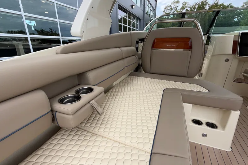 Slide: The Image of Luxurious interior of 2027 Chris-Craft Launch 35 GT with beige seating and cup holders. - 30